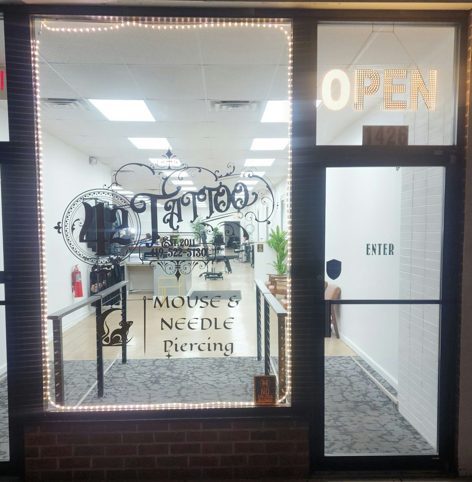 Mouse and Needle Piercing, piercing studio in Mansfield, OH