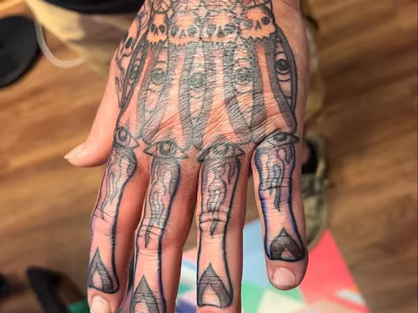 Alien Phone Tattoo, tattoo shop in Fort Walton Beach, FL